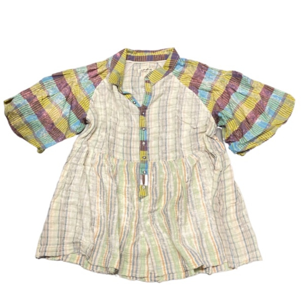 Perfect in plaid baby doll-inspired design with puff sleeves for added shape.